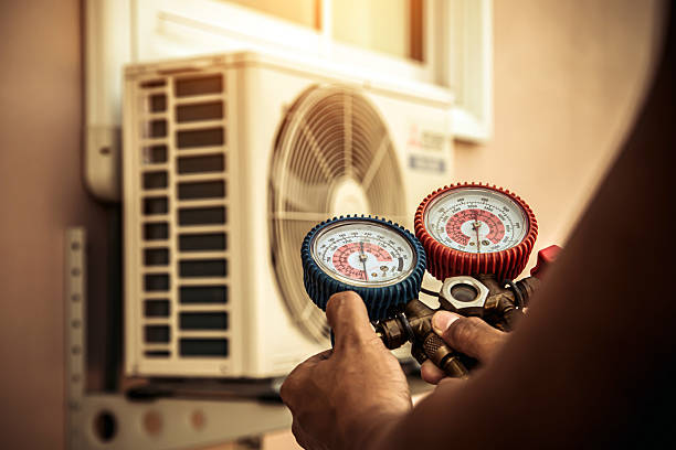 Professional Air Conditioning Service technician working in Lavelle, PA